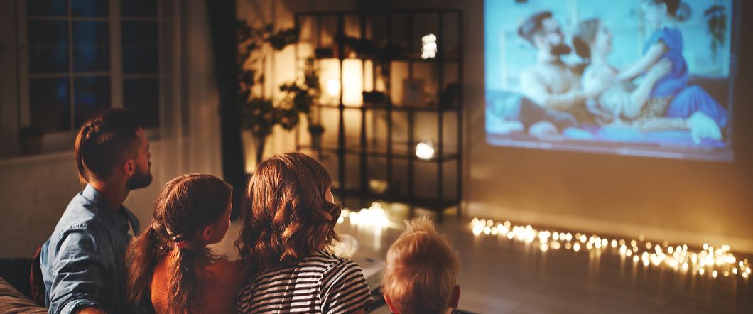 Bringing Your Film Back To Life With Negative Scanning Services A family has movie night with an old family recording rescued through negative scanning.