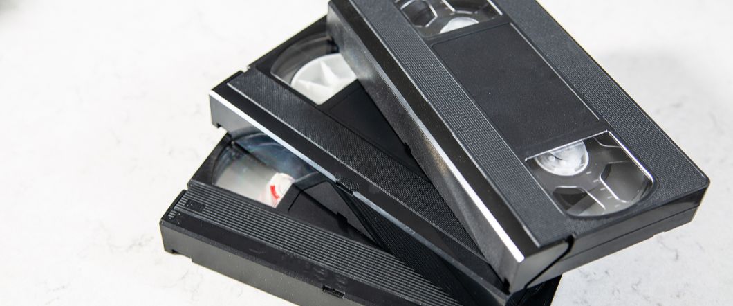 Can You Transfer Damaged VHS Tapes? What’s Possible & What’s Not Stack of unlabeled VHS tapes on a white background
