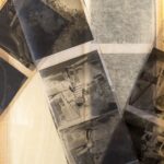 Old negatives on a yellowed envelope.