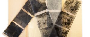 Old negatives on a yellowed envelope.