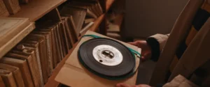 How To Estimate The Runtime Of An 8mm Film Reel An 8mm film reel on a backing, able to be measured.