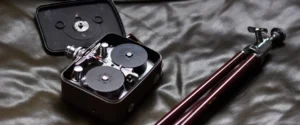 An 8mm film recorder that fell and broke open, possibly damaging the film.