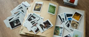 How To Scan Polaroid Photos A collection of polaroid photographs on an old album.